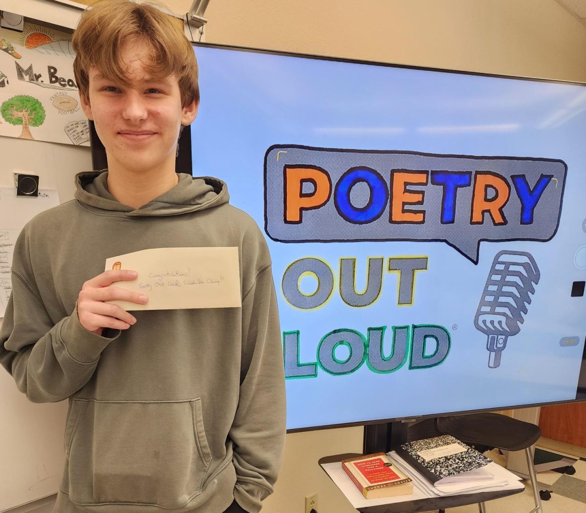 Riley OHara, sophomore, wins first place in Poetry Out Loud contest. He will compete at the county level.