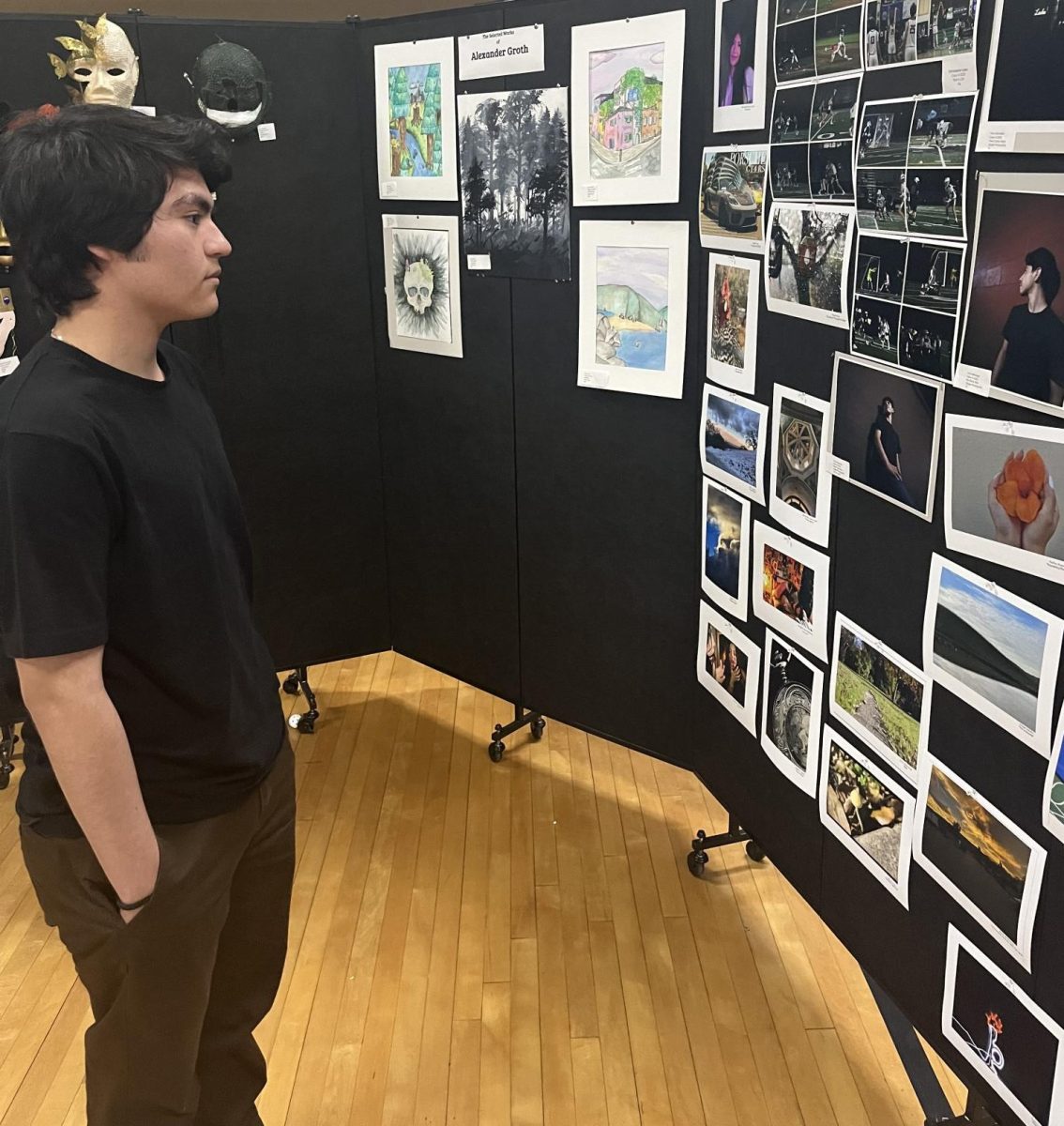 student looking at the Art show