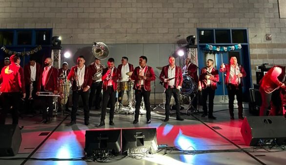 The live band playing at 2024's Noche Latina.