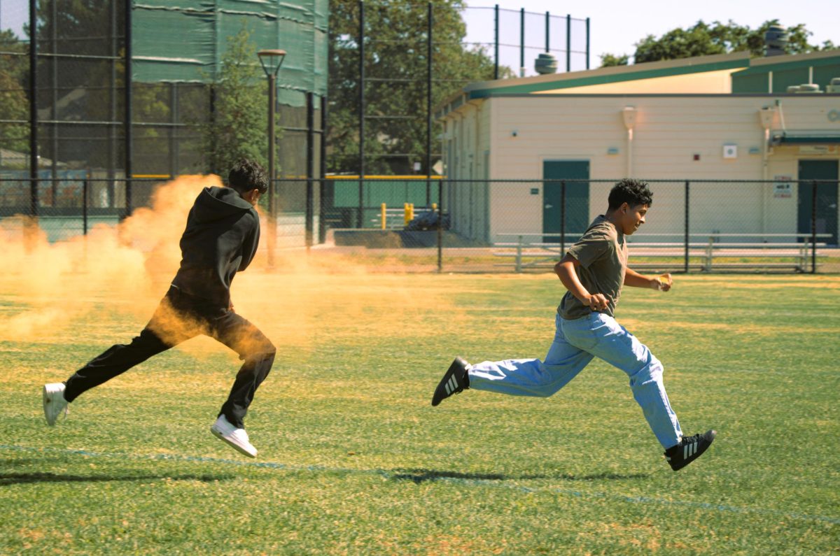 Students participate in powder palooza during Dragon Day on Thursday, Sept. 4.