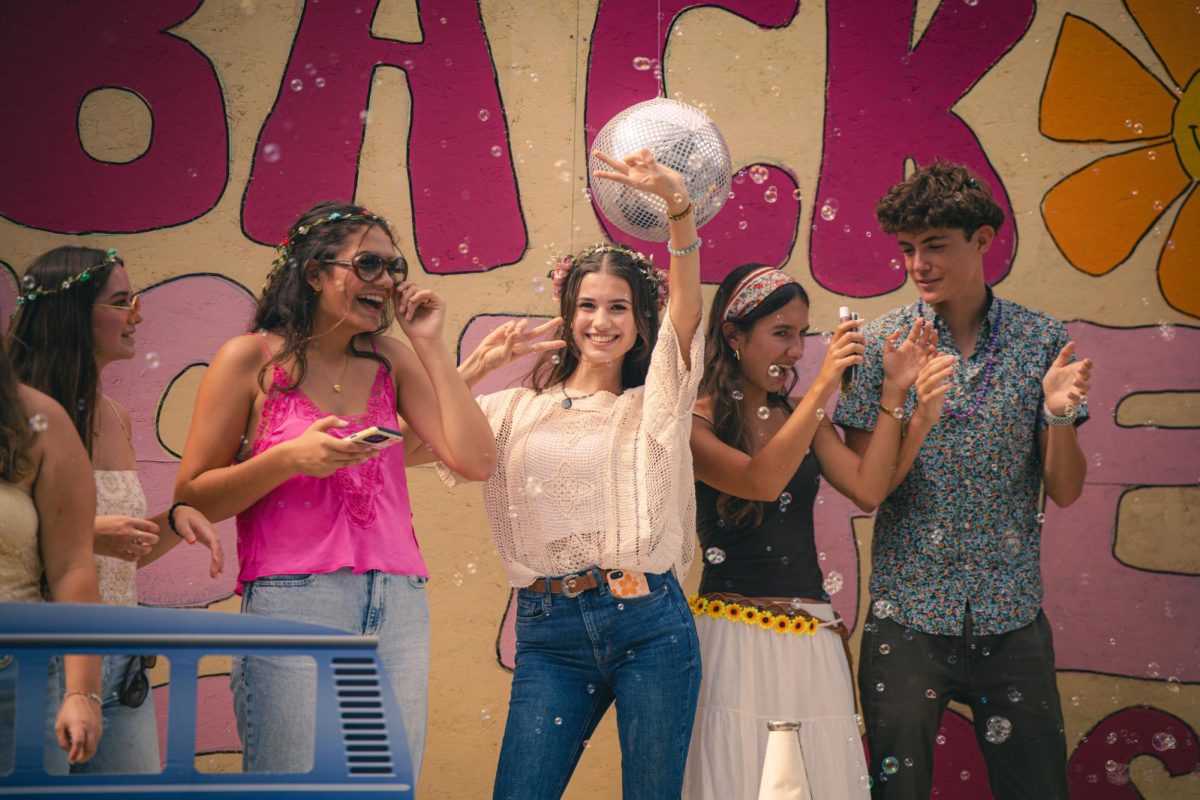 The juniors' 1970s-inspired float