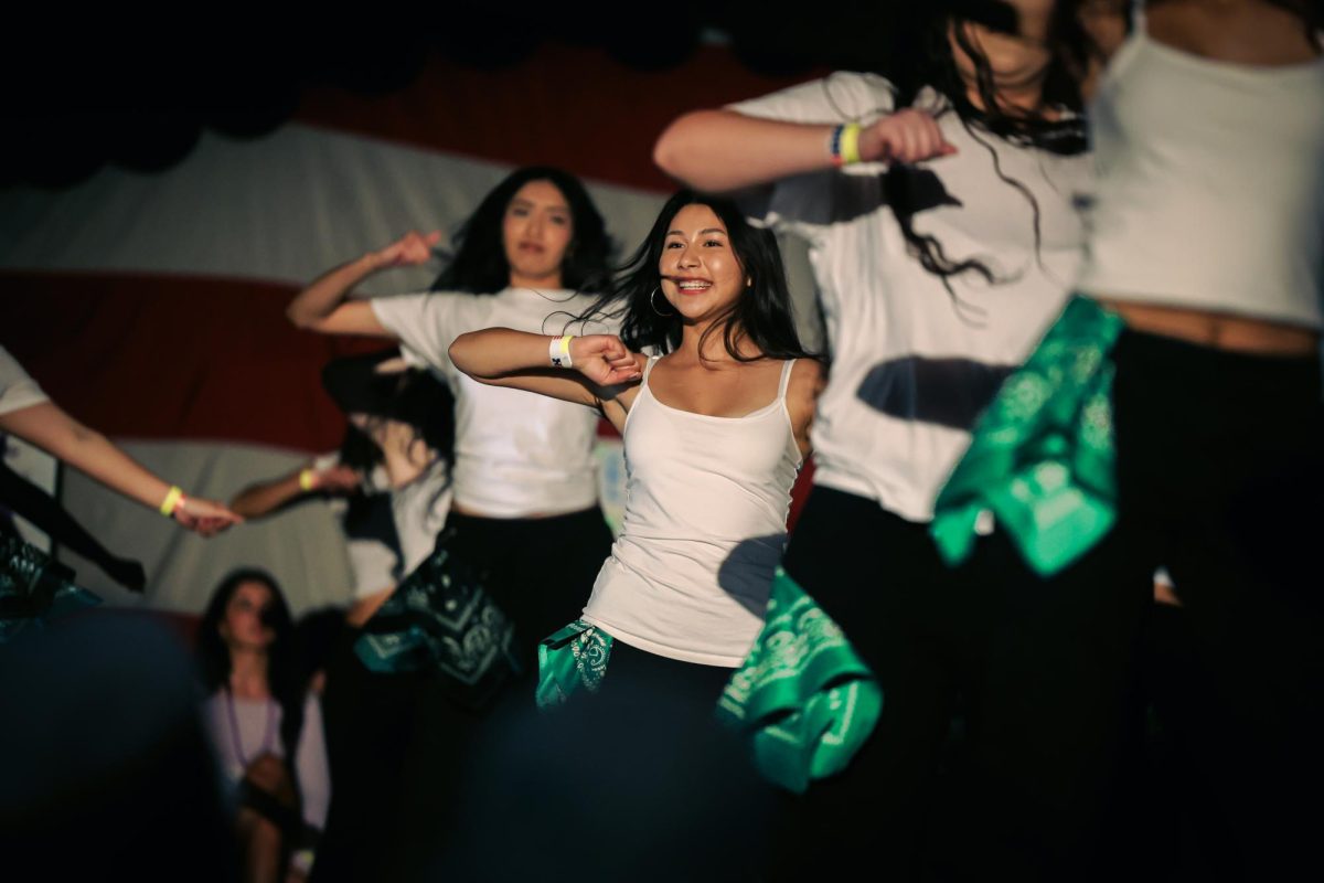 Sheccid Zarco and other dance team members dance to “Where Them Girls At” by David Guetta.
